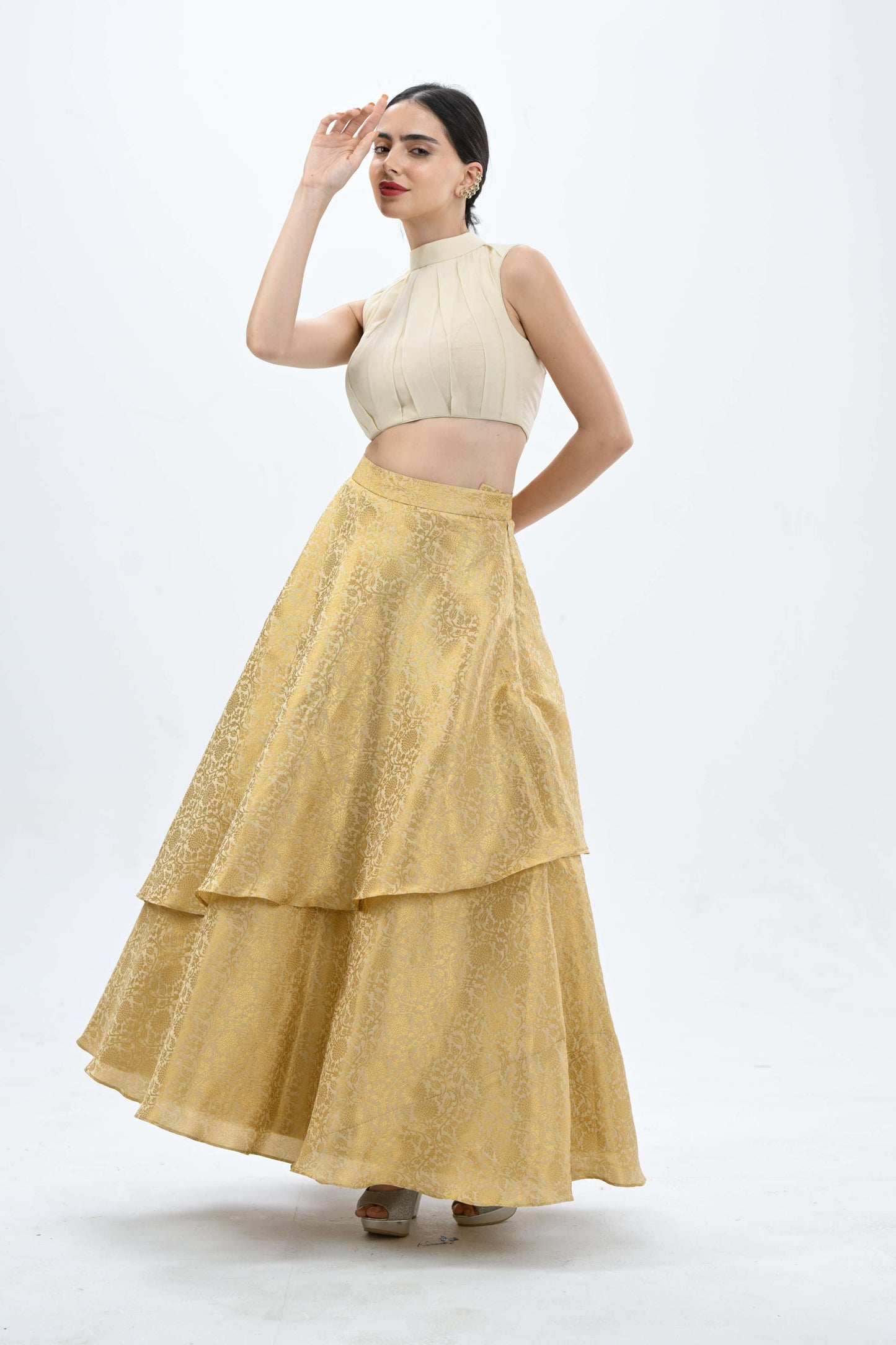 Halter neck Ersa off-white and gold lehenga by LabelN